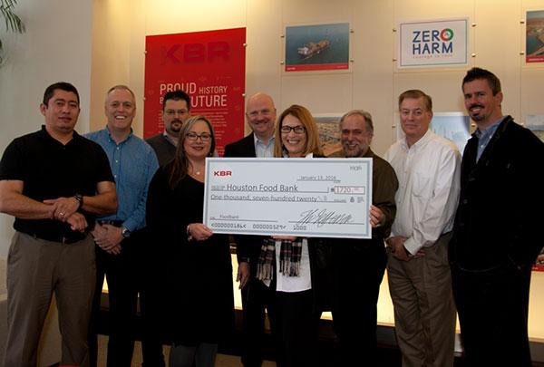 KBR IT team gives check to Houston Food Bank